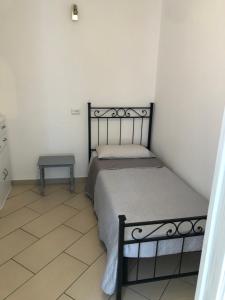 Ein Bett oder Betten in einem Zimmer der Unterkunft Rent Apartment Sardegna