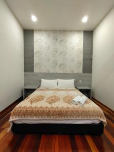 Postelja oz. postelje v sobi nastanitve Jawa Townstay