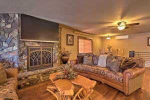 A seating area at Modern Deadwood Apt with Mountain Views and Grill!