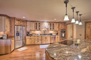 A kitchen or kitchenette at Modern Deadwood Apt with Mountain Views and Grill!