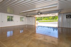 a large empty room with a swimming pool at Modern Deadwood Apt with RV Parking and Views! in Deadwood
