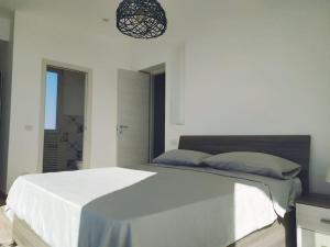 Ένα ή περισσότερα κρεβάτια σε δωμάτιο στο Sciara Eolie