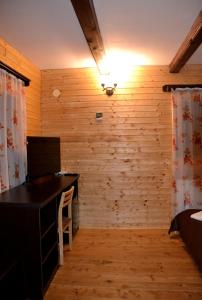 Posezení v ubytování Casa "Cabana Varciorog Arieseni"