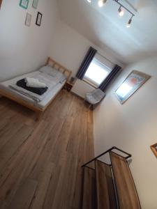 Łóżko lub łóżka w pokoju w obiekcie Appartement Müllner