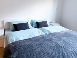 Cama o camas de una habitación en Ferienwohnung Burgpanorama