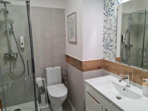 Kúpeľňa v ubytovaní Apartament Wyszyńskiego 10