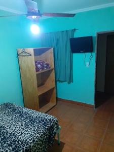 Postel nebo postele na pokoji v ubytování Habitaciones Daniel