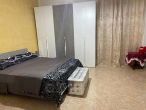 Posteľ alebo postele v izbe v ubytovaní Casa vacanza Giusi