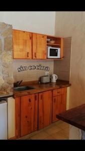 Кухня или мини-кухня в Tano Gaucho
