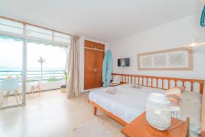Ένα ή περισσότερα κρεβάτια σε δωμάτιο στο Ocean Views