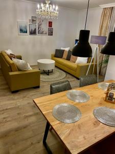 A seating area at Home Sweet Apartment XL