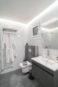 Koupelna v ubytování Lux Palace Trikala + 37 fotografií