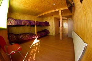 Palanda nebo palandy na pokoji v ubytování Hostal El Pichon