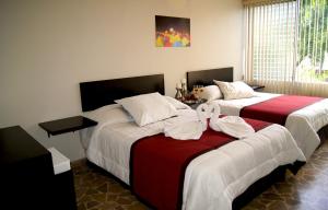 Posteľ alebo postele v izbe v ubytovaní G y V Hotels