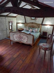 Tempat tidur dalam kamar di Gite Rural Charente Maritime