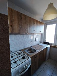 O bucătărie sau chicinetă la NoclegwGdyni24