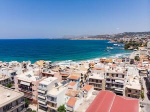 an aerial view of a city and the ocean at Urban Residences Chania in Chania Town