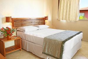Cama ou camas em um quarto em La Torre Resort All Inclusive