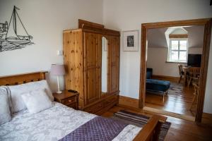 Voodi või voodid majutusasutuse The Moorings B&B toas