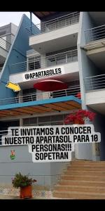 a building with a sign on the side of it at Condominio Terrazas del Sol 11 - 202 in Sopetran