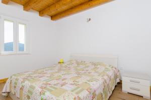 Posteľ alebo postele v izbe v ubytovaní Vacation House Bosa