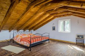 Posteľ alebo postele v izbe v ubytovaní Vacation House Bosa