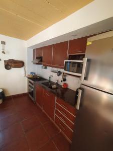 Кухня или мини-кухня в Casa Cuatro Robles

