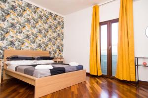 Katil atau katil-katil dalam bilik di Cuore di Spaccanapoli
