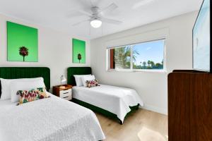 Voodi või voodid majutusasutuse Cocoa Beach Towers toas