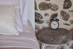 Postel nebo postele na pokoji v ubytování Patriko Nisyrian Guesthouse