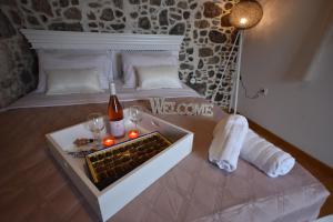 Postel nebo postele na pokoji v ubytování Patriko Nisyrian Guesthouse