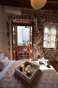 Postel nebo postele na pokoji v ubytování Patriko Nisyrian Guesthouse