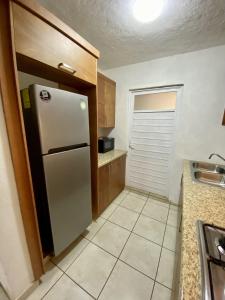 Kuchyň nebo kuchyňský kout v ubytování Herradura VIP Inn