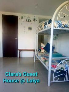 Postel nebo postele na pokoji v ubytování Clara's Guest House at Laiya
