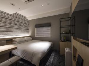 Postel nebo postele na pokoji v ubytování Tmark City Hotel Kanazawa