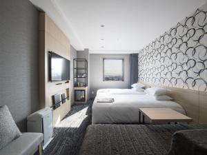 Postel nebo postele na pokoji v ubytování Tmark City Hotel Kanazawa