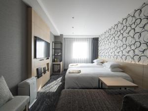 Postelja oz. postelje v sobi nastanitve Tmark City Hotel Kanazawa