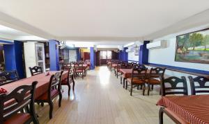 A restaurant or other place to eat at Hotel Corbelli