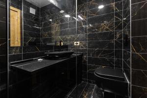 Koupelna v ubytování Hotel Livnica