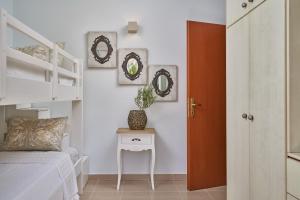 Postel nebo postele na pokoji v ubytování Amore Kastellia-Althea Homes