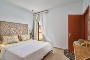 Postel nebo postele na pokoji v ubytování Amore Kastellia-Althea Homes