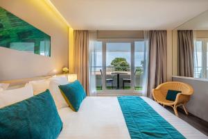 Postel nebo postele na pokoji v ubytování Hôtel Le B d'Arcachon by Inwood Hotels
