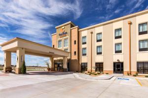 a rendering of a hotel with a building at Comfort Suites in Liberal