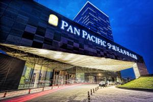 a building with a sign that reads pan pacific singapore at Pan Pacific Ningbo in Ningbo