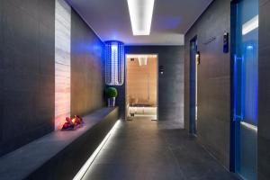a hallway with a fire place in a bathroom at LHP Napoli Palace & SPA in Naples