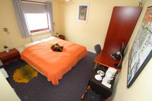 Postel nebo postele na pokoji v ubytování Igdlo Guesthouse