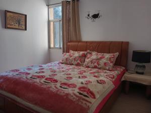 En eller flere senge i et værelse på Yuanyang Flower and Horse Inn