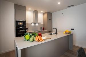 Kuchyňa alebo kuchynka v ubytovaní NC APARTMENTS RAMBLA3