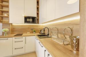 Kuchyňa alebo kuchynka v ubytovaní Apartamenty Almar Diune