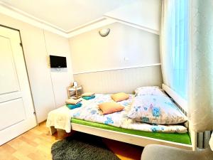 Säng eller sängar i ett rum på Ziołowa Dolina